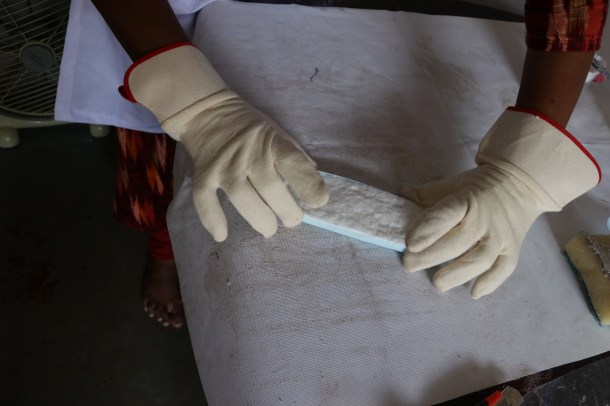 Just before the pad is sealed in cloth